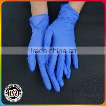 Disposable nitrile examination gloves