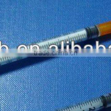 yellow insulin syringe