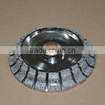 Vacuum brazed diamond grinding wheel for polishing large stone