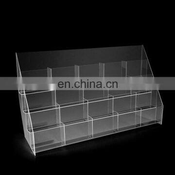 Ladder shaped clear acrylic brochure display rack with many pockets