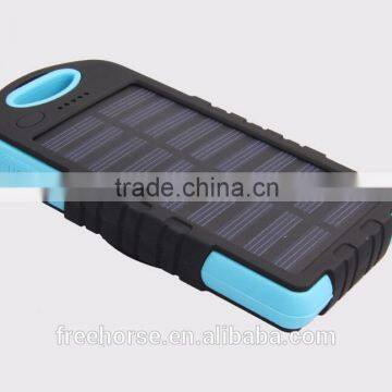 OEM factory China 8000 mah portable solar battery charger for mobile phone with led light