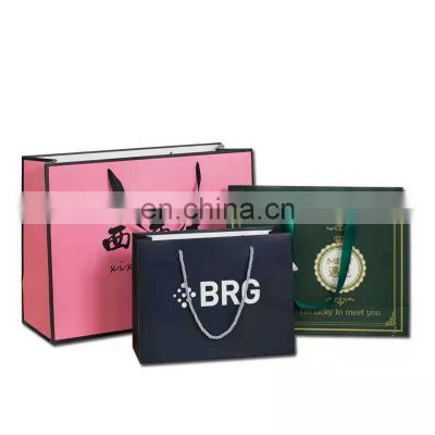 Custom retail bulk paper bags design cheap shopping paper packaging gift bag with logo print