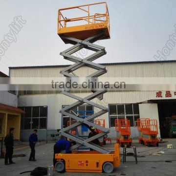 Self propeled scissor hydraulic mini lift table