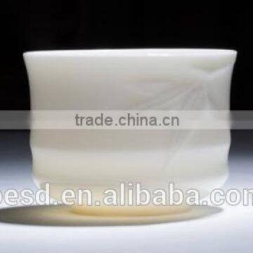 Hot white ceramic mug with tea mug