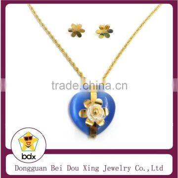 Hot sale gold stainless steel heart shape blue stone flower pendant and stud earrings chains necklace jewelry set made in China