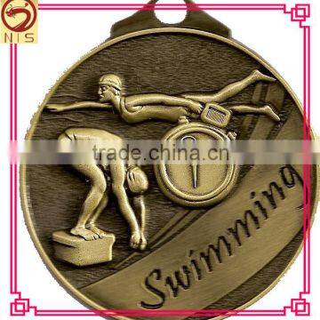 custom antique gold swimming medal