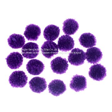 Purple yarn kids crafting pom