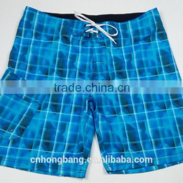 bright blue plaid print men's board shorts with side pocket in stock