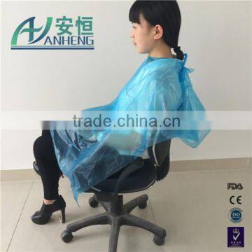 Cheap disposable blue PE hair cutting cape for salon and SPA