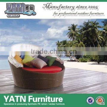 Outdoor round wicker lounge bed with canopy