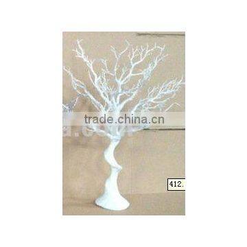 Decorative white plastic tree for holiday decoration