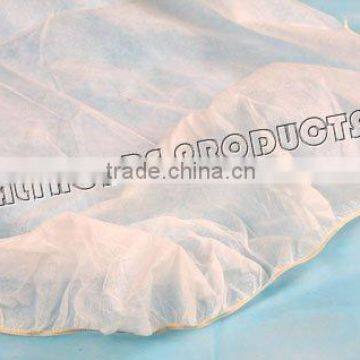 Nonwoven bed cover