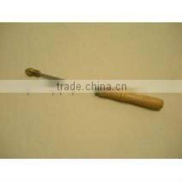 Brass wire embedder with wooden handle