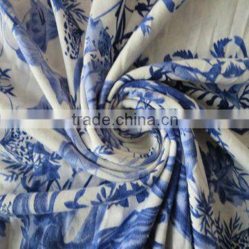 Knitting printed poly spun fabric for garments