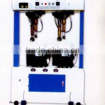 Universal sole attaching machine