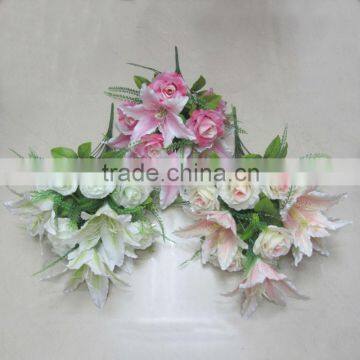 plastic lily and rose flower bouquet