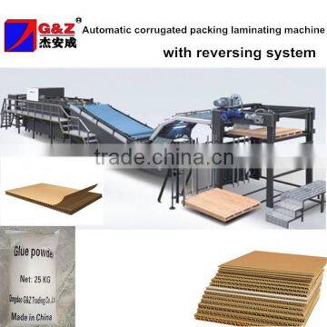 Automatic corrugated packing laminating machine with reversing system