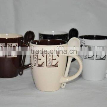 assorted color glazed mug with spoon