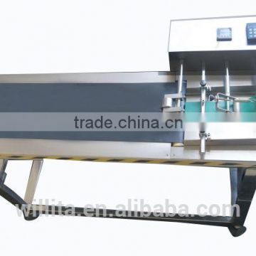 conveyor paging machine