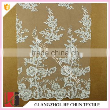 HC-5628-1 Hechun Guangzhou Beautiful Clear Sequin Bead Venice Bridal Lace Fabric for Dress                        
                                                Quality Choice