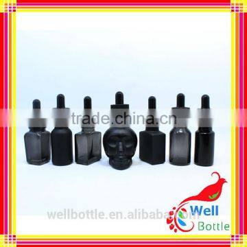 Custom design glass bottle for grey glass dropper bottle with skull shape glass dropper bottle for e-juice