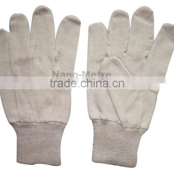 NMSAFETY cheap skin color cotton gloves Nature jersey 7 oz cotton glove, knit wrist.