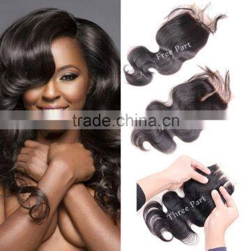 Brazilian body wave virgin hair bundles with lace closure,cheap free parting lace closure