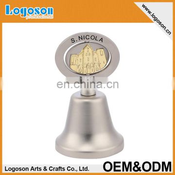 Top spining custom small metal souvenirs dinner bell brass bell