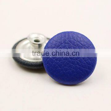 Leather covered button for trousers