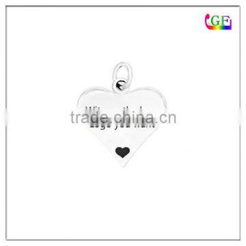 Custom logo stamp on heart pendant