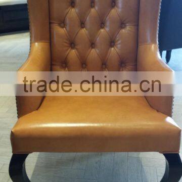 contemporary french orange leather wing chairs