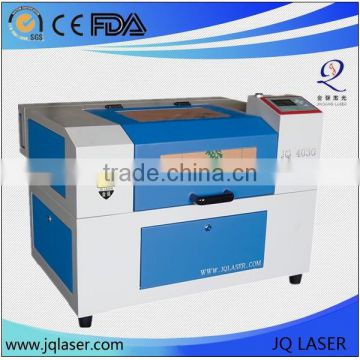 Mini CO2 laser cutting machine JQ4030 price