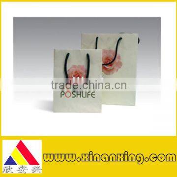 art paper bag with a flower