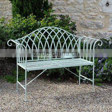 Light green wrought iron garden bench