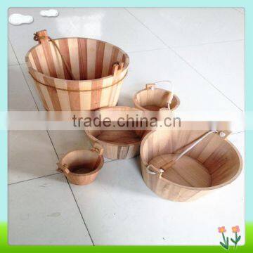 handmade wooden barrel or wooden bucket with water