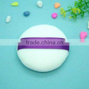 cosmetic cotton puff with ribbon