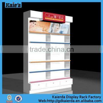 Fashionable cosmetic display stand design wood display table shop for sale