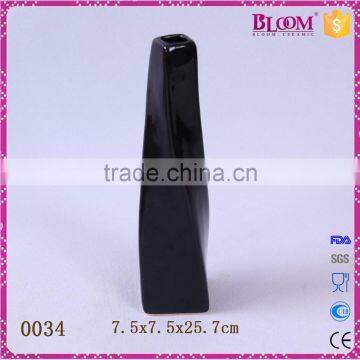 Irregular shape ceramic black glaze single flower vase