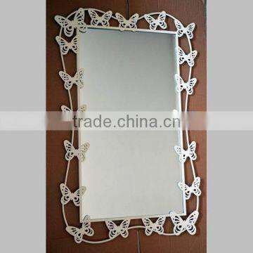 Metal mirror with butterfly