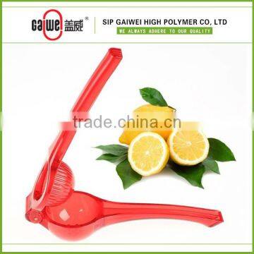 Plastic manual citrus fruit juicer tongs