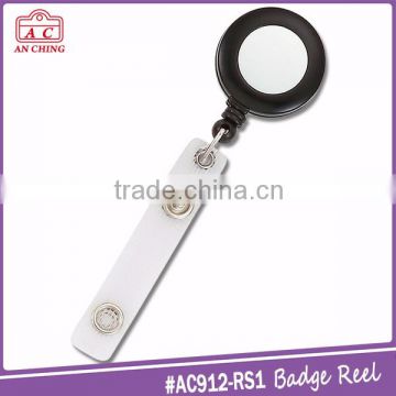 Multifunction badge reel retractor with belt clip and reinforced strap