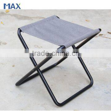 small black folding luggage rack for guest room