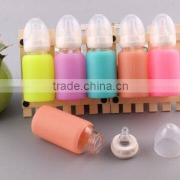 High Quality Durable Heat resistant Clear Glass Milk Bottle with soft silicone sleeve