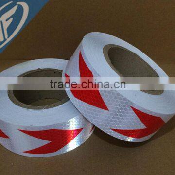 red and white direction arrow logo reflective sticker tape