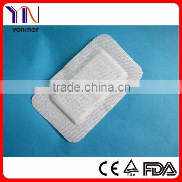 Non woven surgical adhesive dressing