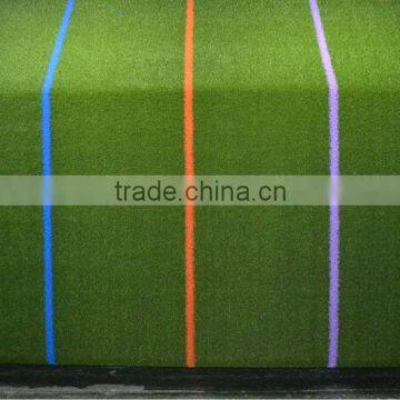 different colors of lines on the playground artificial grass mat