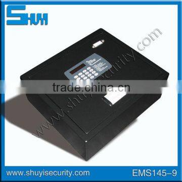 Top load hidden floor safe