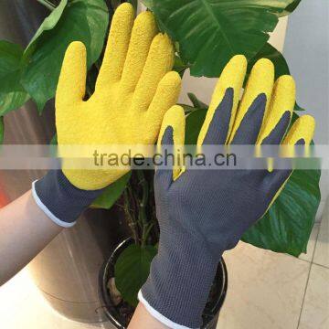 NMSAFETY peach picking use 13g yellow color latex palm safety gloves