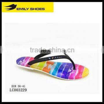 Lady's casual flip flops with rainbow insole pattern