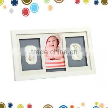 Adorable baby print set with wall frame